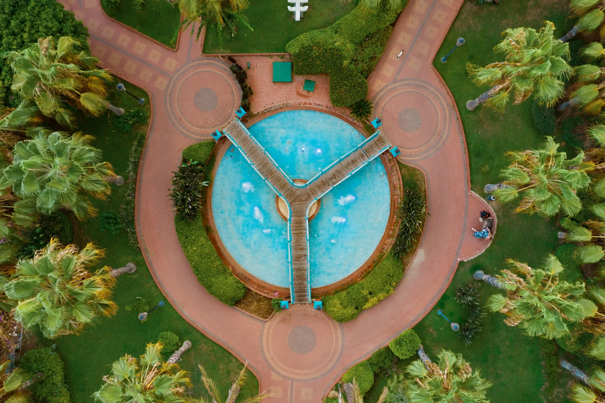 Aerial drone view looking down on a swimming pool
