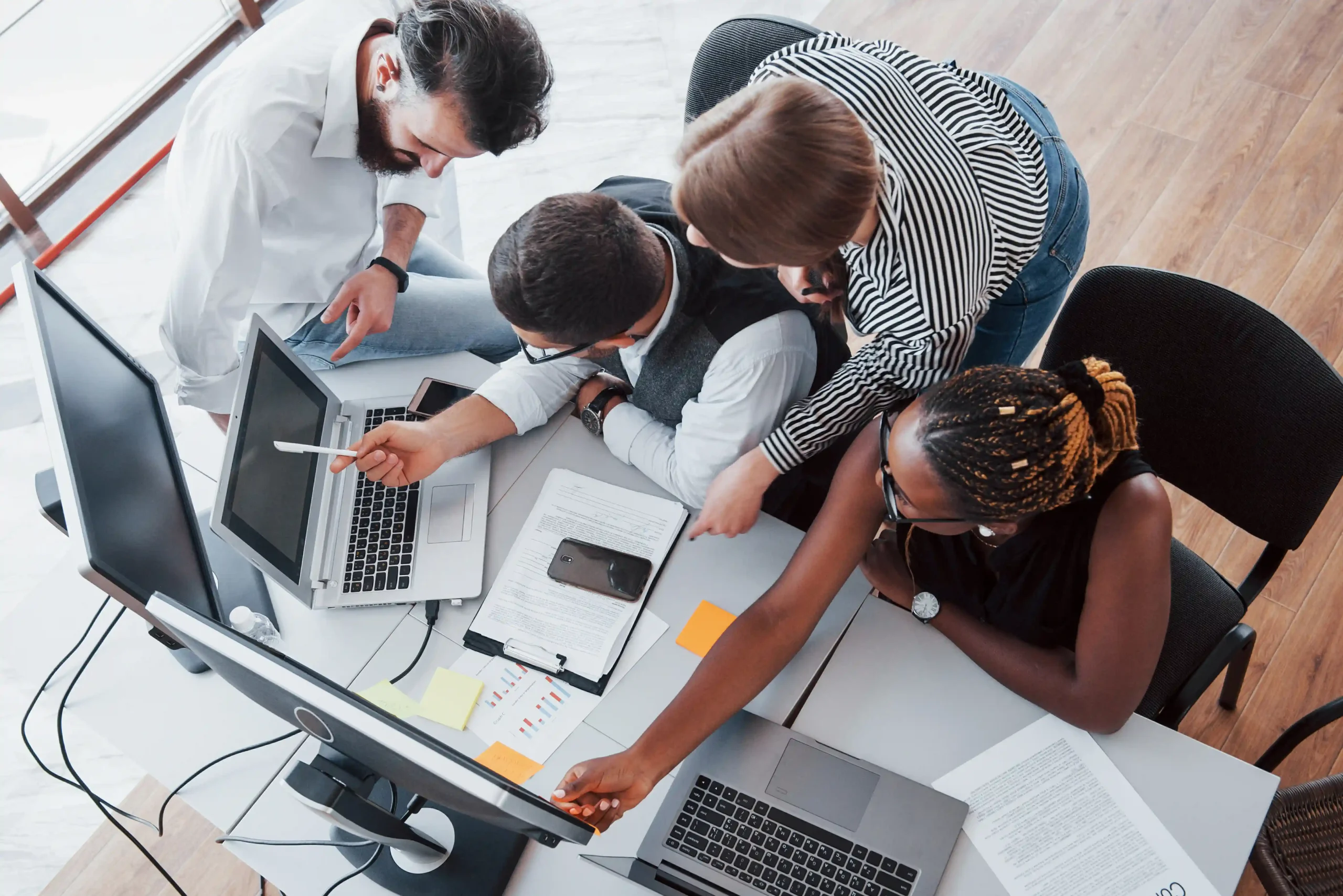 Team working together in an office during a brand campaign shoot